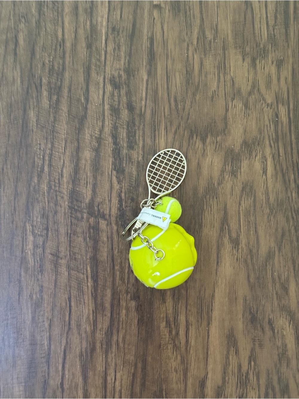 Urban outfitters Tennis Ball & Racket Keychain - Neon Yellow